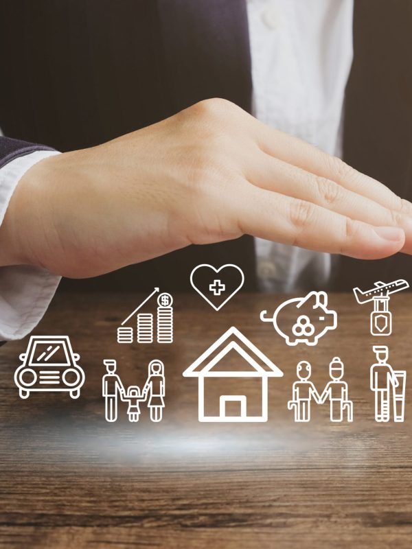 Businessman protecting car , house , life ,healthcare , family , travel insurance icon.